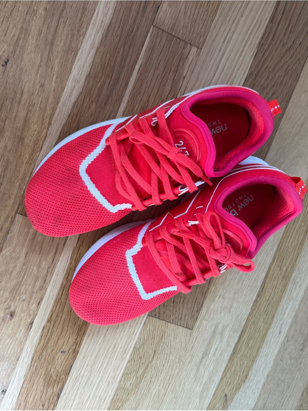 New Balance Women's Athletic Sneakers in Bright Red and White